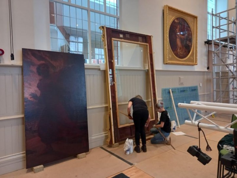 'The Remorse of Judas' being prepared for rehanging at Maesteg Town Hall, 2024